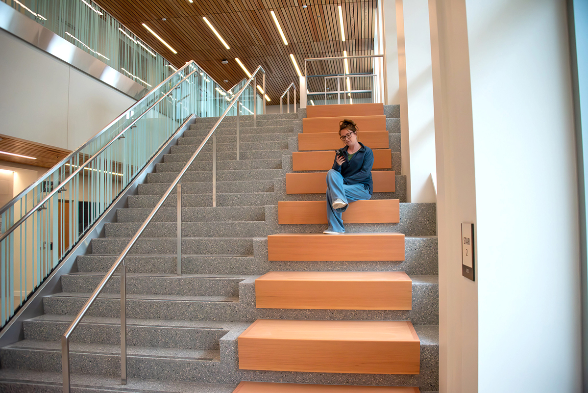 stairs with seating alongside